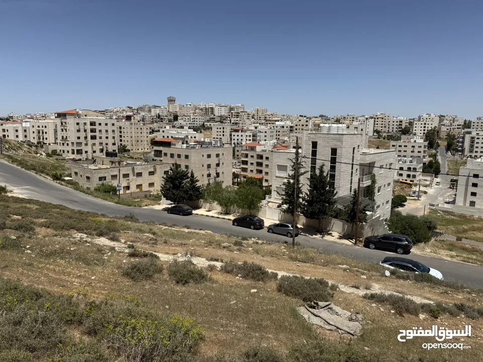 ارض الحويطي 1311 م للبيع قرب شارع المطار / خلف المدارس العالميه  على شارع 12 متر ...مع المالك مباشره