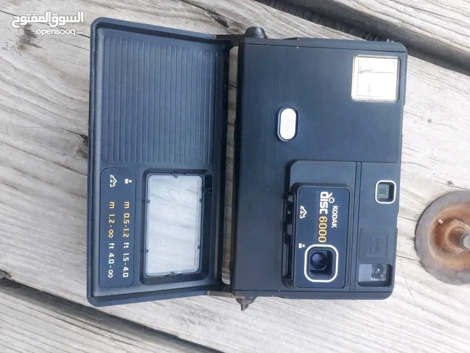 polarid sx70 & OLYMPUS & KODAK DISC