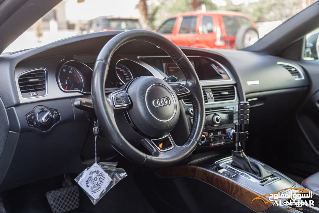Audi A5 Coupe 2013 Quattro   السيارة وارد الشركة و قطعت مسافة 121,000 كيلو متر