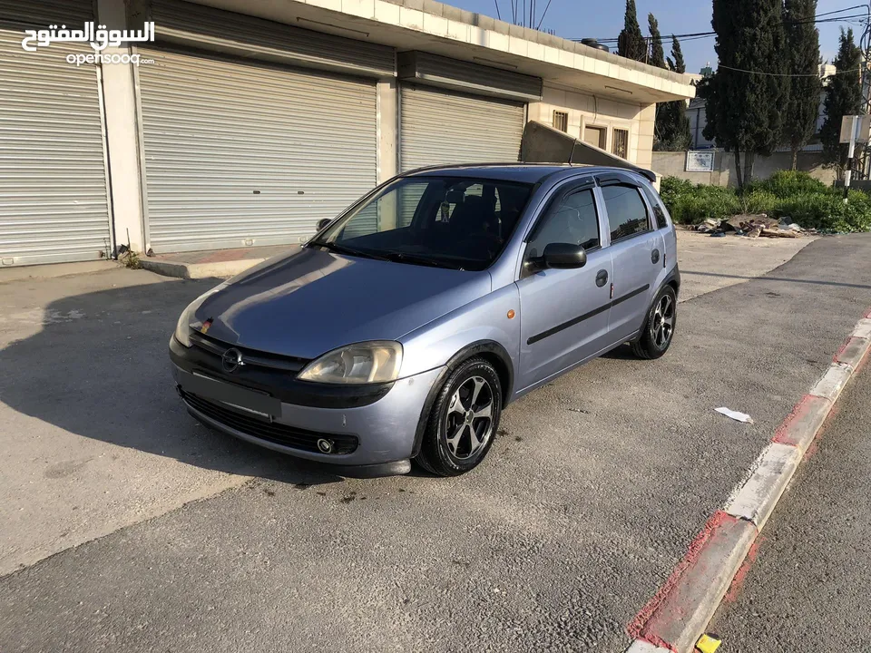 اوبل كورسا 2003اتمات