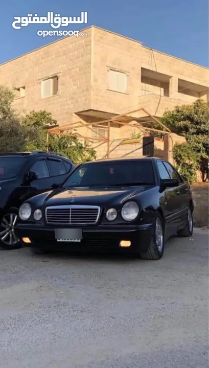 مرسيدس W210