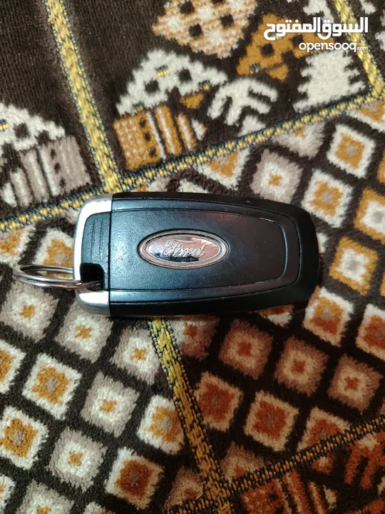 للبيع مفتاح فورد أصلي (بصمة) يعمل بنظام التشغيل الذكي (Keyless Entry & Push Start).