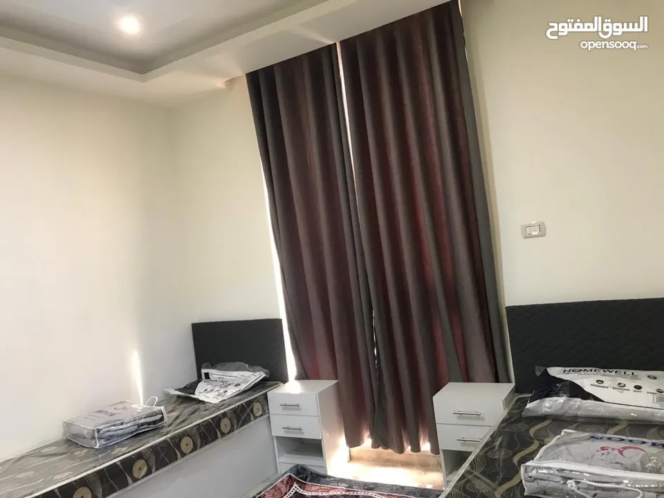 شقة راقية مفروشة للإيجار مقابل البوابة الشمالية - Modern furnished apartment for rent
