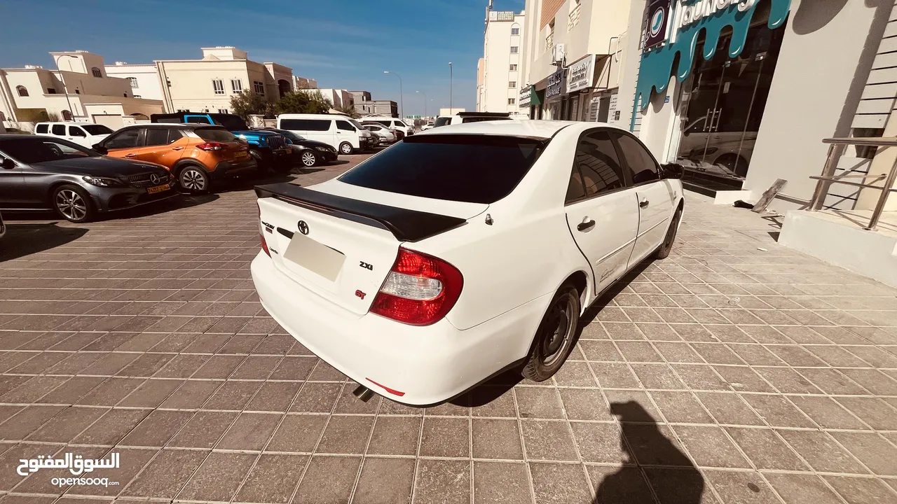 Toyota Camry 2004 model with mulikya valid till Nov 2025 with uae insurance