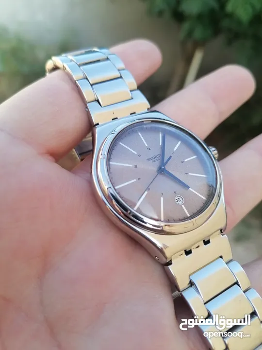 #SWATCH  سواتش سويسري اصلي لومينوس شباك للتاريخ  حجم 41 بحالة ممتازه  40 دينار