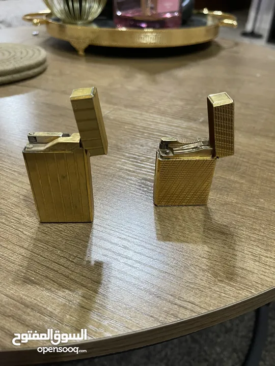 ولاعتين ديبونت ( s t Dupont )صناعه فرنسيه مطلي بالذهب