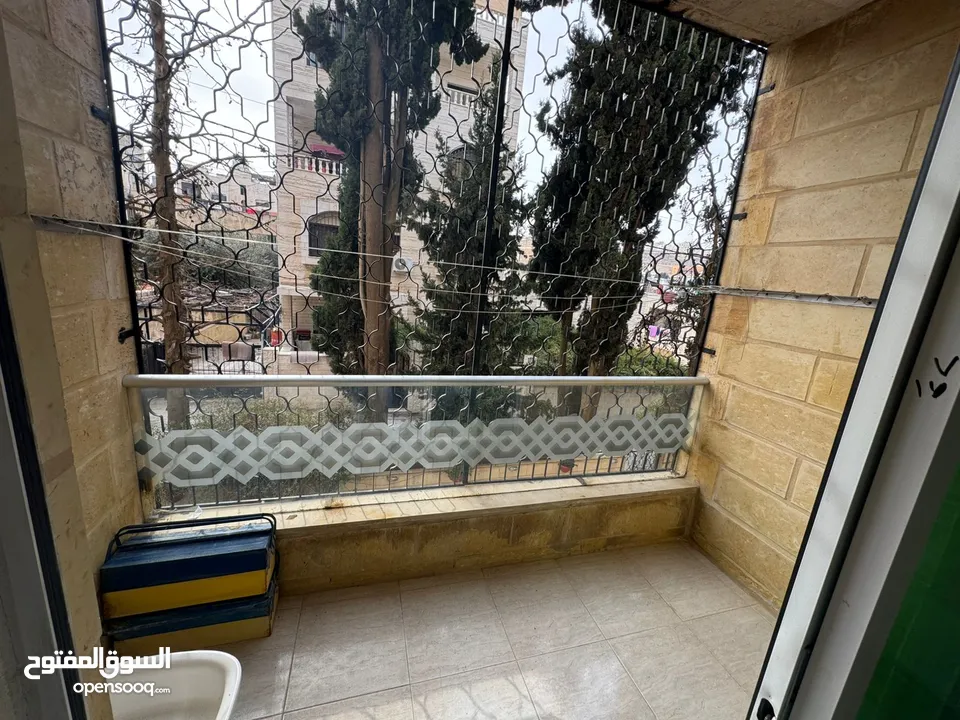 شقة للبيع في صويلح  طلوع سامح مول 150 متر طابق ارضي  3 غرف نوم، صالة وصالون و كراج و مخزن و حمايات