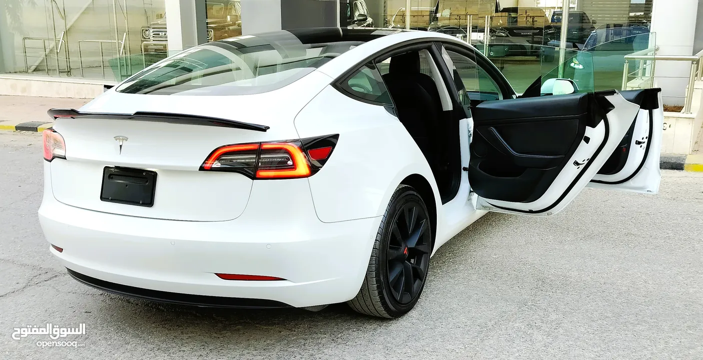 تيسلا 2022 model 3 فحص كامل 4 جـــيـــد بدون ملاحظات بودي (كرت ابيض) بحالة الوكالة بسعر لقطة ومحرووق