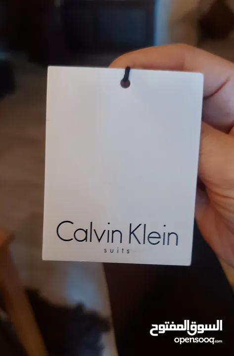 جاكيت جديد ماركة CALVEN KLEIN اصلي وارد اميركا قياس سمول لون زيتي