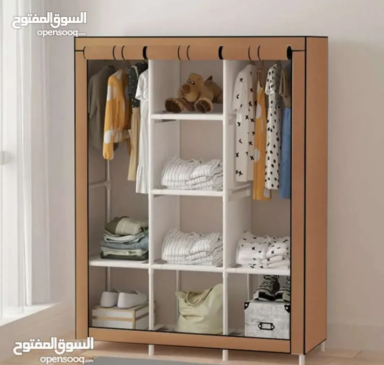 خزانة قماش مثالية لتخزين الملابس إطار المنتج مصنوع من معدن متين ومقاوم .