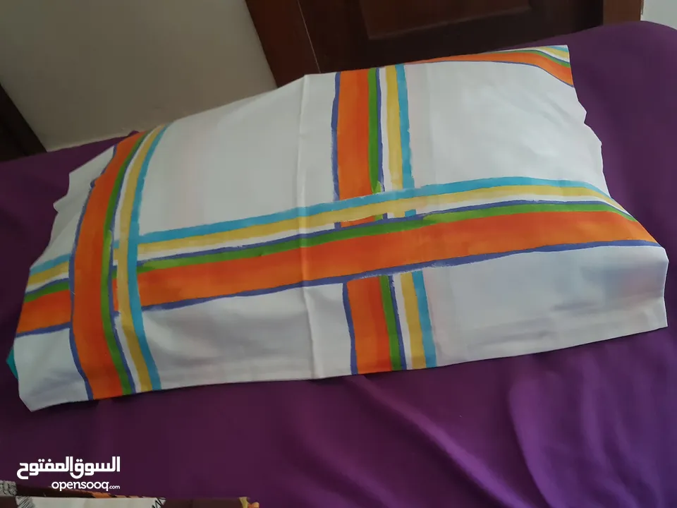 كوشنز كنب ووجه مخدات ومفارش للطاولات