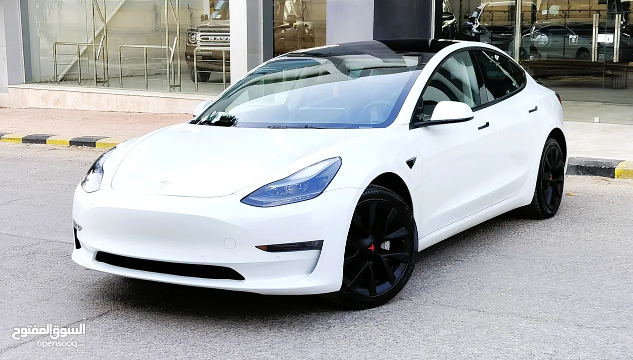 تيسلا 2022 model 3 فحص كامل 4 جـــيـــد بدون ملاحظات بودي (كرت ابيض) بحالة الوكالة بسعر لقطة ومحرووق
