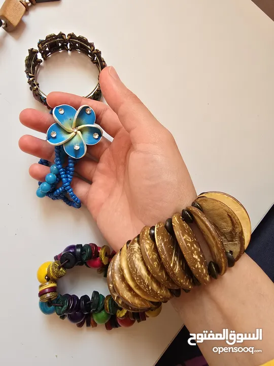 أساور خشب وواحدة حديد (بني أزرق ملون)