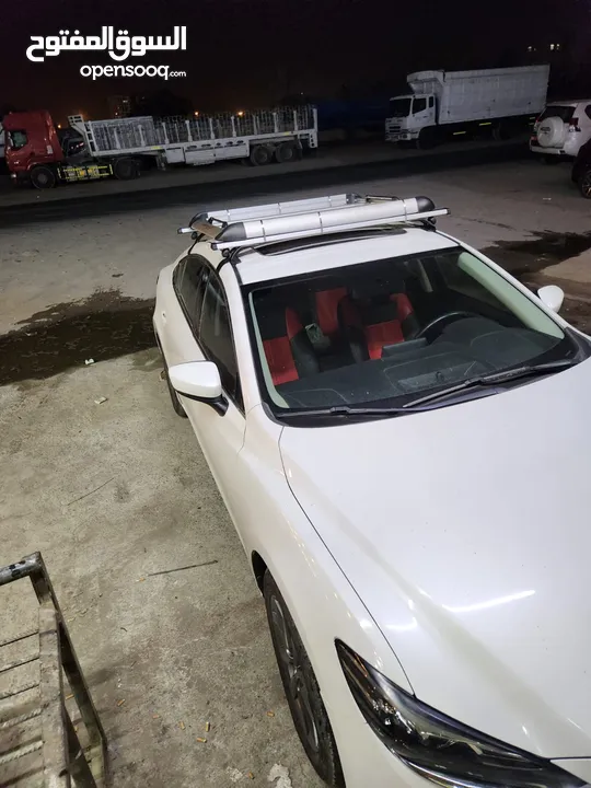Universal roof rack/carrier with basket