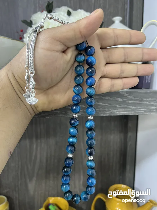 عرض خاص سبحه عين النمر ازرق او ذهبي بسعر حرق 33 حبة حلوة مش صغيرة للعلم مع طقم انتيومون مرتب