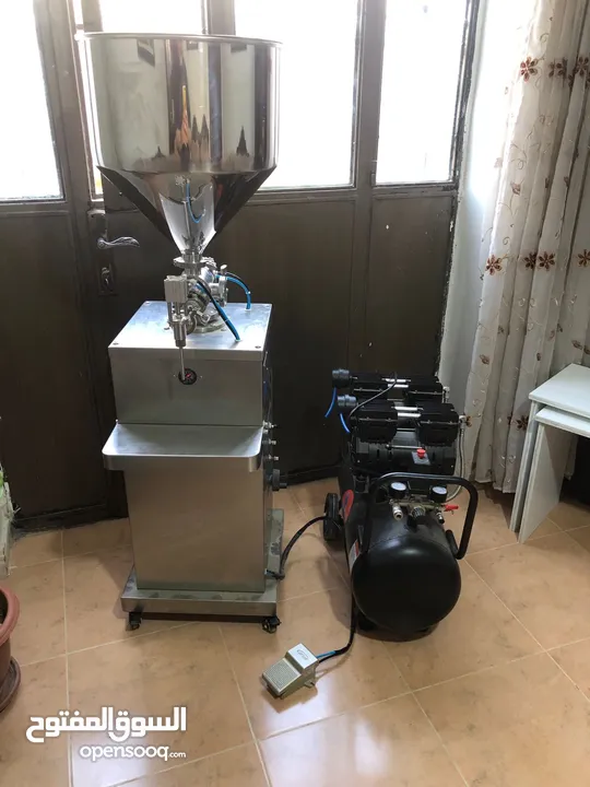 ماكينة تعبئة كريمات شبه جديدة بداعي السفر