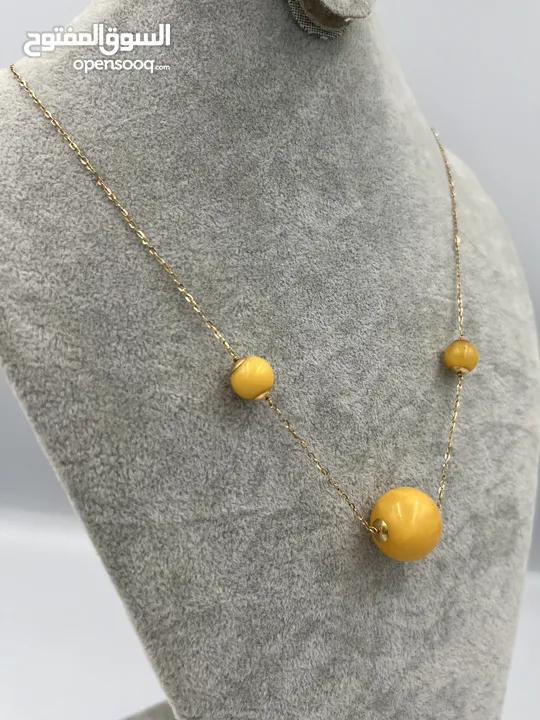 قلادة ذهب بكهرمان كلنغرادي نسائية -Women's 18k gold necklace with natural, untreated Clingard amber