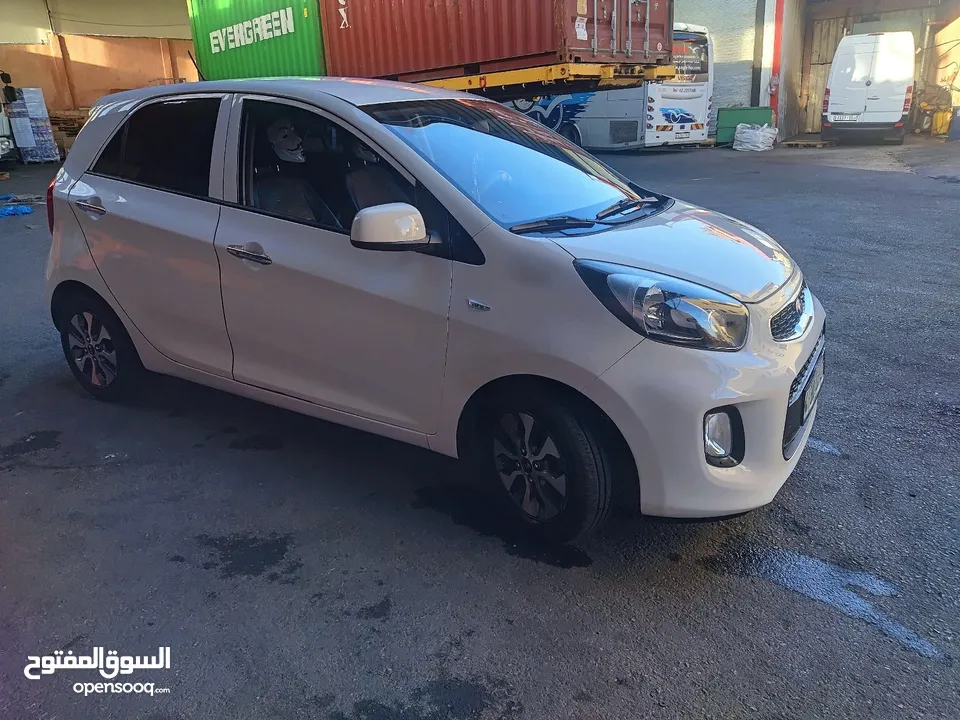 كيا مورنينج 2016 لون ابيض عاجي