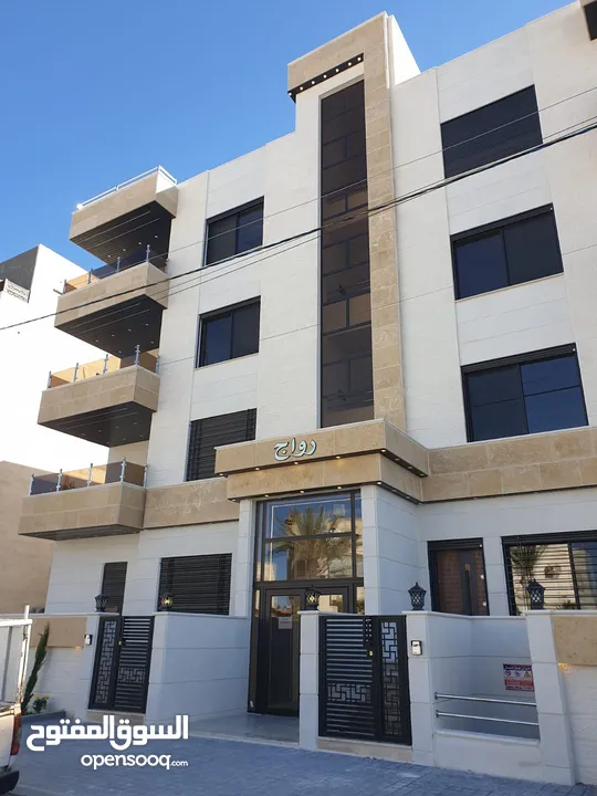 شقة شبه أرضي مع حديقة وكراج مستقل بأجمل مواقع ضاحية الرشيد