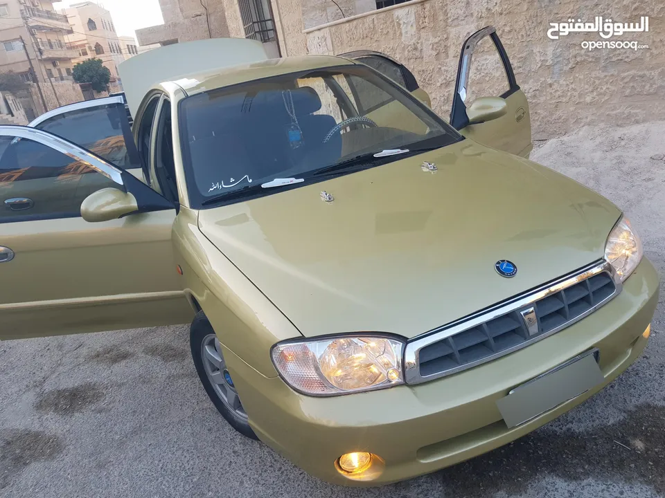 كيا سبكتر توماتيك اقساط دفعة 1200 دهان جديد  ماتور جديد  قير جيد  فحص مرفق  مكانيك سيارة مشية ناعمة