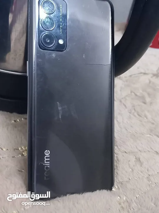 ريلمي Realme Q3 Pro ذاكرة 128عشواي8+5. جهاز كله شغال مبدل شاشه سوبر املد بصمه شغاله وفطر يظهر  شحن ت