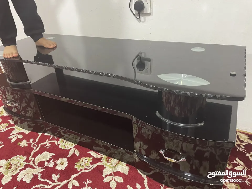 Glass top TV stand