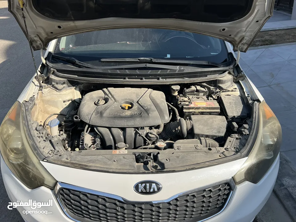 كيا فورتي 2015. Kia forte 2015 1800ccلون ابيض محرك 1800 سيسي