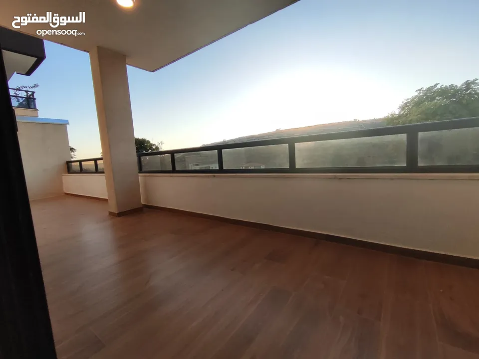 شقة جديدة مفروشة مع حديقة للإيجار – عين منجد  شارع إسكان المهندسين