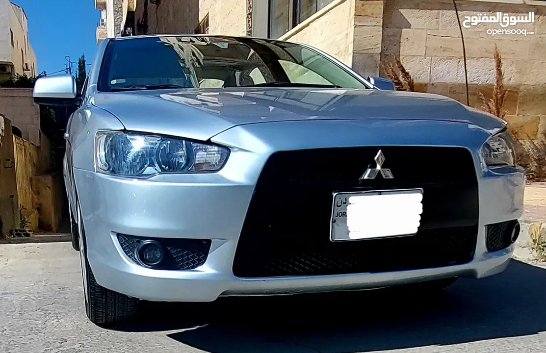 ميتسوبيشي لانسر 2014 بحال الوكالة