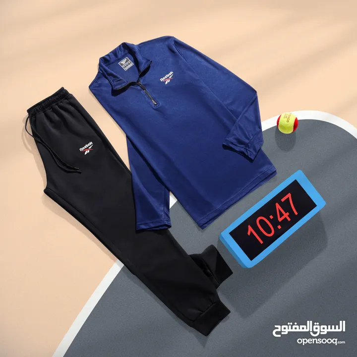 طقم رياضي تيشرت كم + بنطلون Reebok