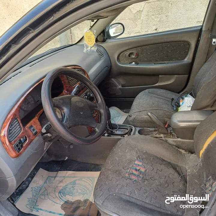 كيا شوما 1999