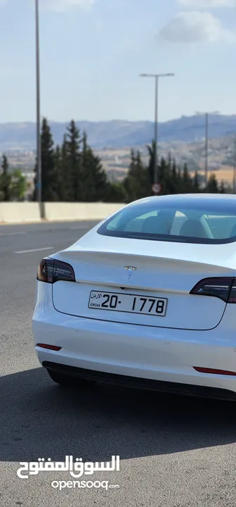 Tesla Model 3 Standerd Plus 2022 ابيض وداخليه ابيض جمرك جديد شهر 12‎ بسعر 20 الف بدون الرقم