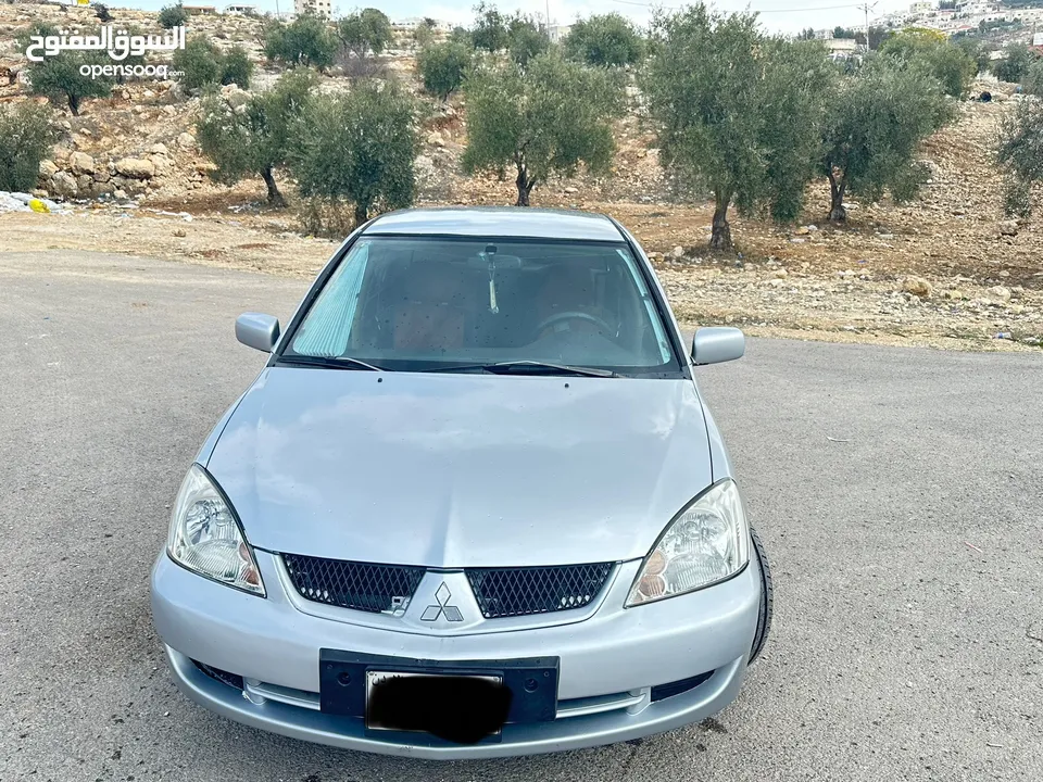 ميتسوبيشي لانسر 2007 ماتور 16 اتوماتيك  / وارد الكويت فحص كامل / كاش أو اقساط