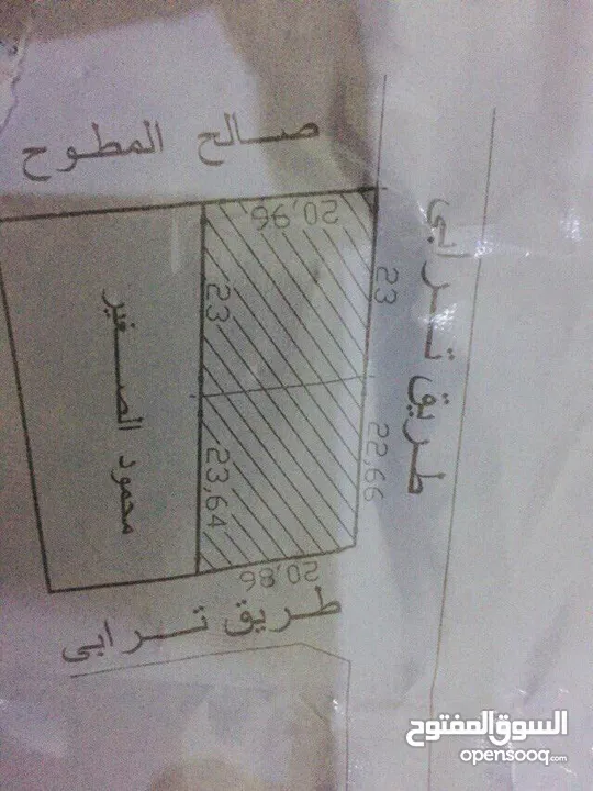 قطعة ارض وجهتين علي الطريق