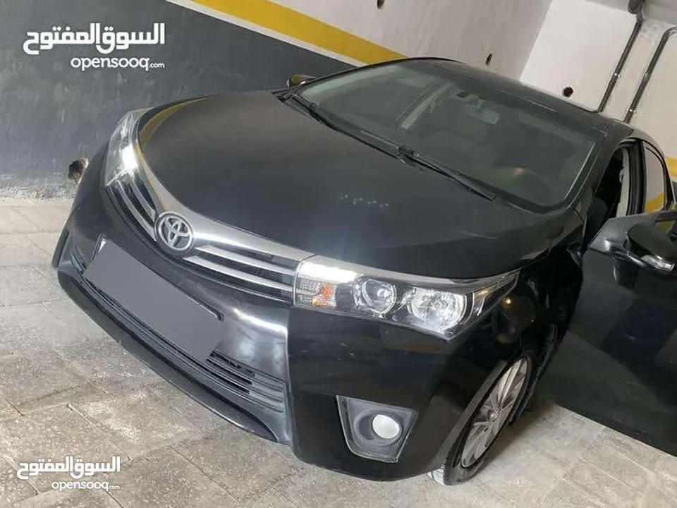 إعفاء طبي- تويوتا كورولا 2015 1600 سي سي كحلي Toyota corolla