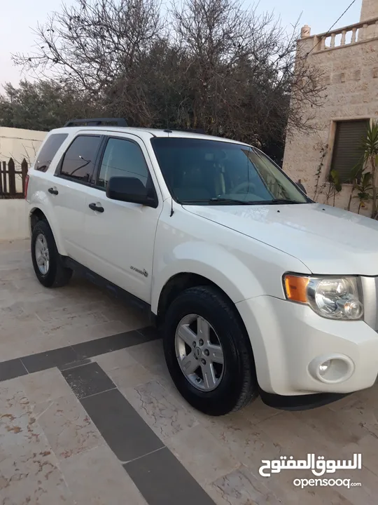 فورد اسكيب أبيض 2009بحالة ممتازه 2500cc