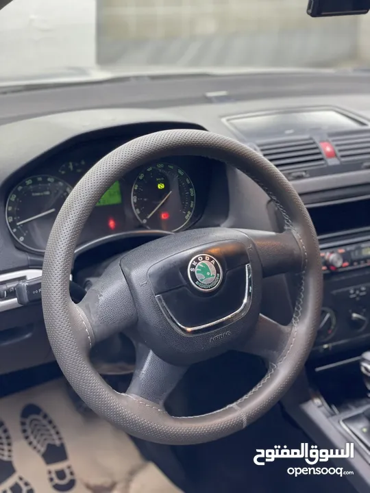 سكودا اوكتافيا بنزين اوتماتيك اصل حكومي مطور 1.6 بحالة الوكاله موديل 2007