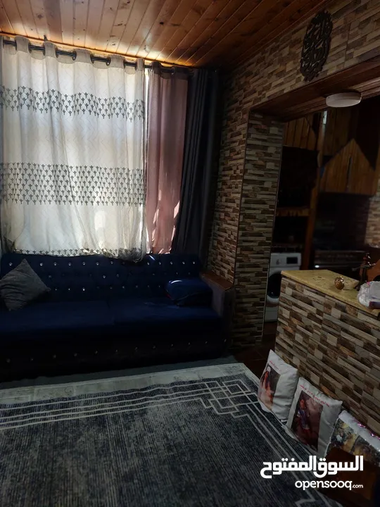 شقه ارضيه للبيع كاش او اقساط عن طريق البنك العربي الإسلامي الدولي في عمان حي نزال على الشارع الرئيسي