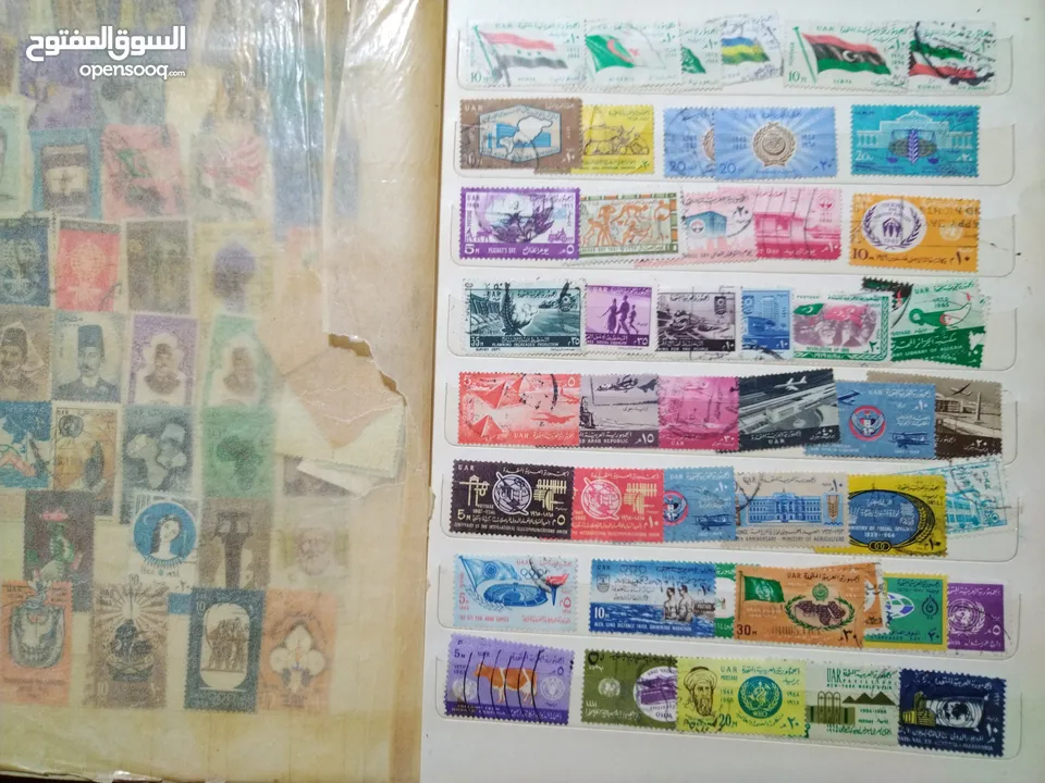 نيشان ملكى وزن41, 41 جرام من الدهب والفضه وعقدفضه من الاحجار الكريمه وطوابع قديمه نادره