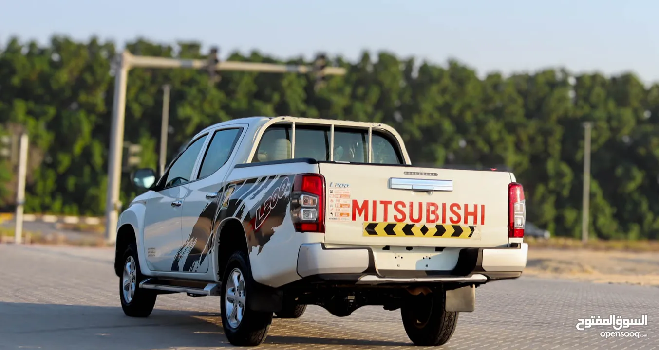 Mitsubishi L200 2.4 L 2021 GCC accident free in excellent condition 1303 P.M