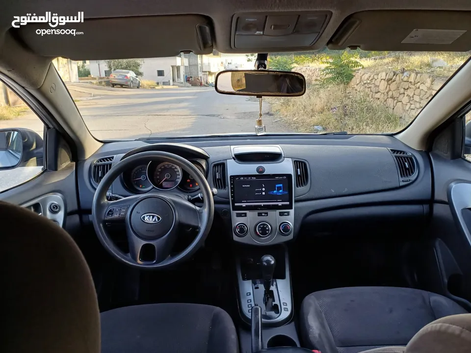 دفعه كيا فورتي 2009 ماتور1600 بنزين جير اوتماتيك حساسات خلفي مكيف شغال شبابيك كهر