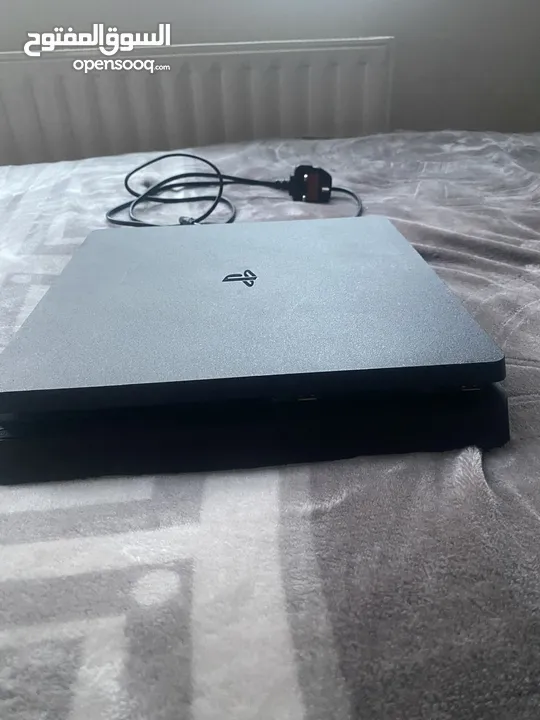 Playstation 4 slim 500Gb with 3 ps4 discs