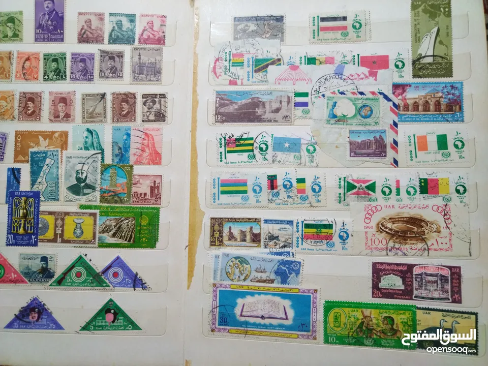 نيشان ملكى وزن41, 41 جرام من الدهب والفضه وعقدفضه من الاحجار الكريمه وطوابع قديمه نادره