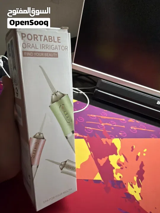 Portable Oral Irrigator) جهاز ري فموي