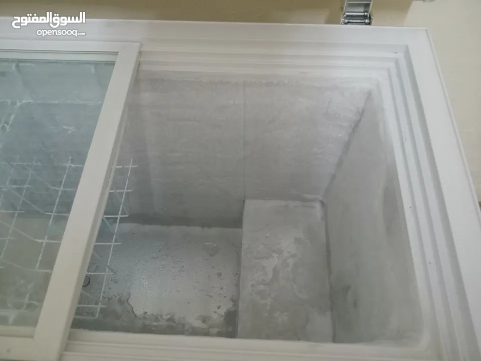 فريزر نيوتن ناشونال بطح  300 لتر مع 2 سلال و أبواب زجاج وموفر طاقة ++A