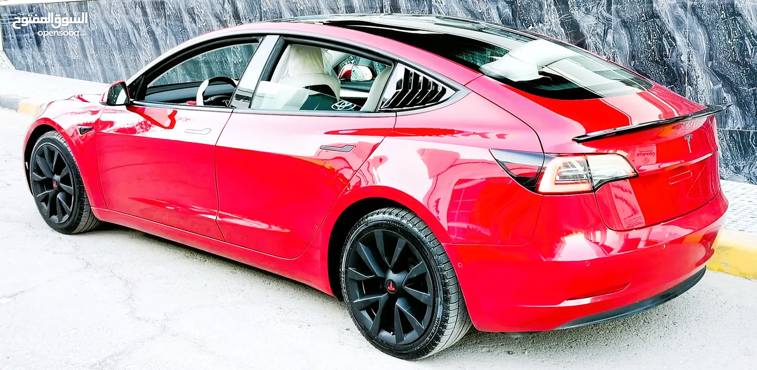 تيسلا 2022 model 3 فحص كامل 4 جــيـــد بدون ملاحظات غرفة جلد ابيض لون مميز بحالة الوكالة بسعر لقطة