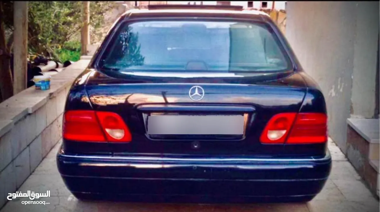 مرسيدس W210