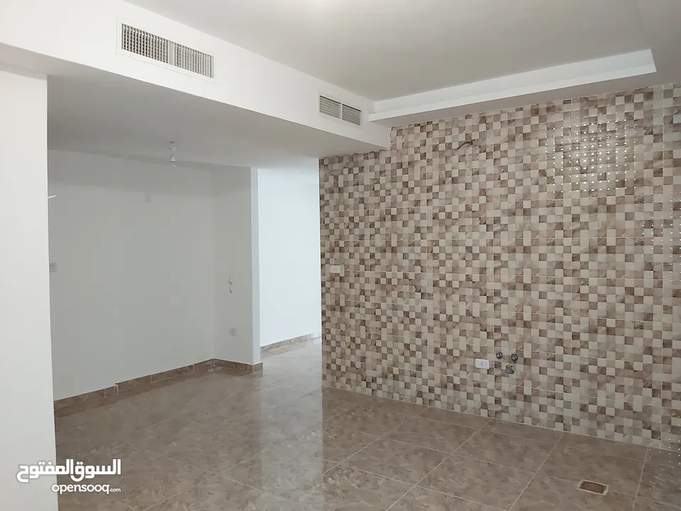شقة للبيع غرفتين نوم في ضاحية الامير راشد شارع ابراهيم قطان