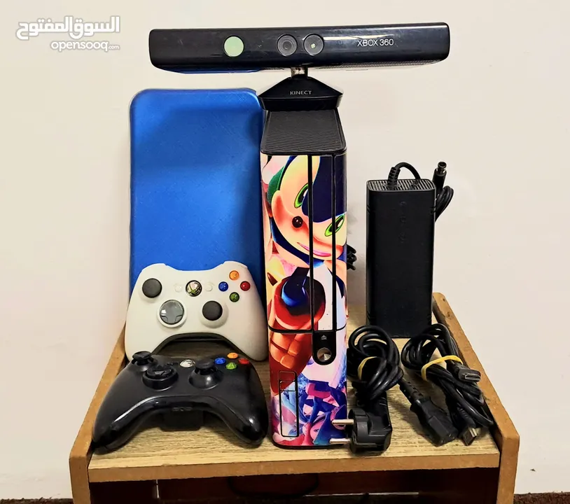 للبيع جهاز العاب xbox 360 معدل Gtag مع كاميرا و سعة تخزين 250 جيغابايت مع مجموعة كبيرة من الالعاب