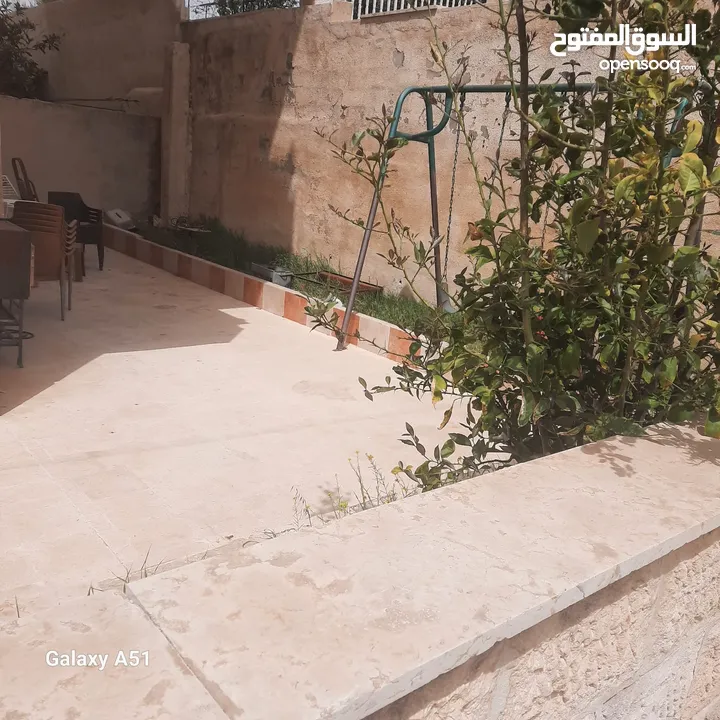 شقة للبيع شبه ارضي بأجمل مناطق ضاحية الرشيد
